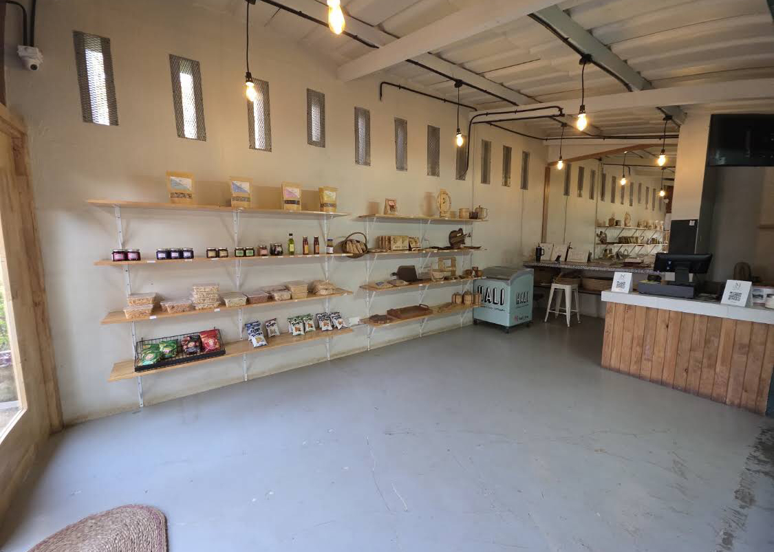 Orchid pantry shelves stocked with local produce